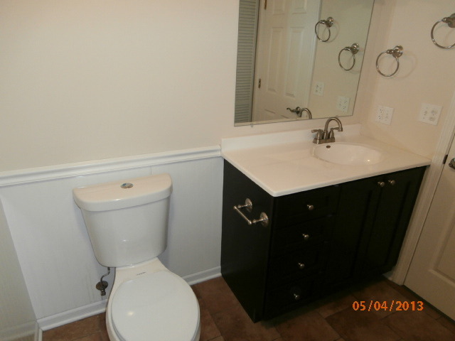 334 Rodenburg Road Roselle, IL 60172 - Photo 6 of 14 a bathroom with a sink toilet and a mirror