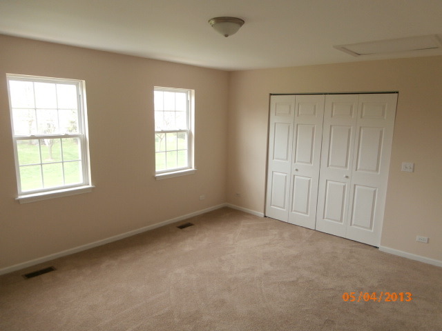 334 Rodenburg Road Roselle, IL 60172 - Photo 10 of 14 a view of an empty room with a window