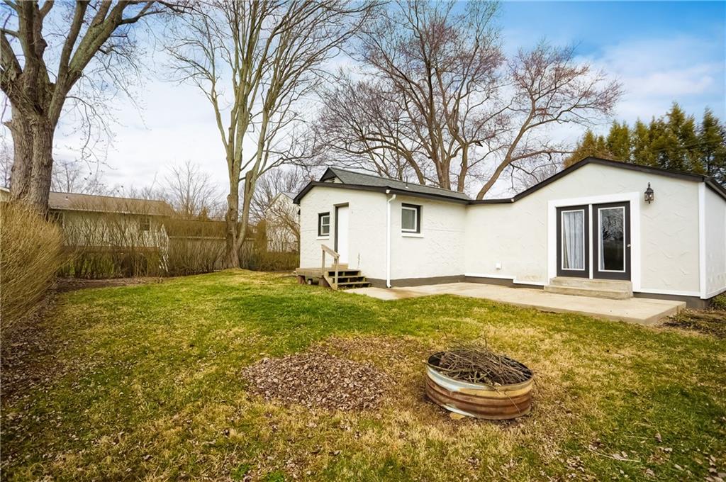 549 Sawmill Run Road Butler, PA 16001 - Photo 24 of 25 a white house that has a big yard with wooden fence
