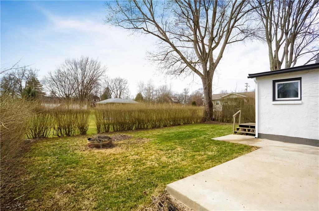 549 Sawmill Run Road Butler, PA 16001 - Photo 25 of 25 a backyard of a house with lots of green space and fountain