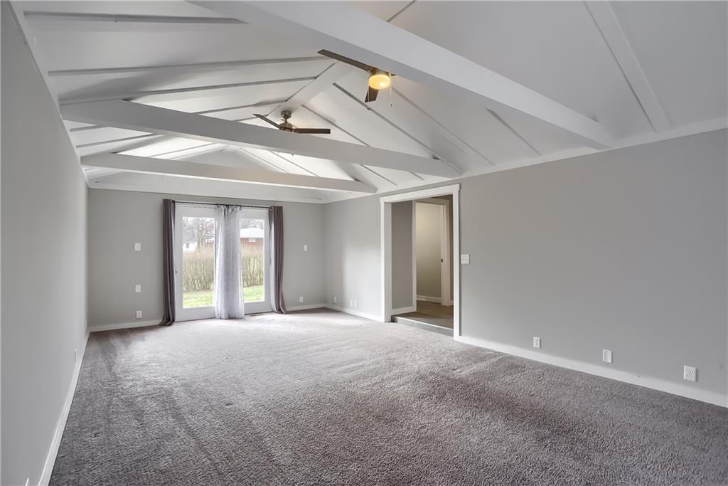 549 Sawmill Run Road Butler, PA 16001 - Photo 3 of 25 a view of an empty room with chandelier and a window