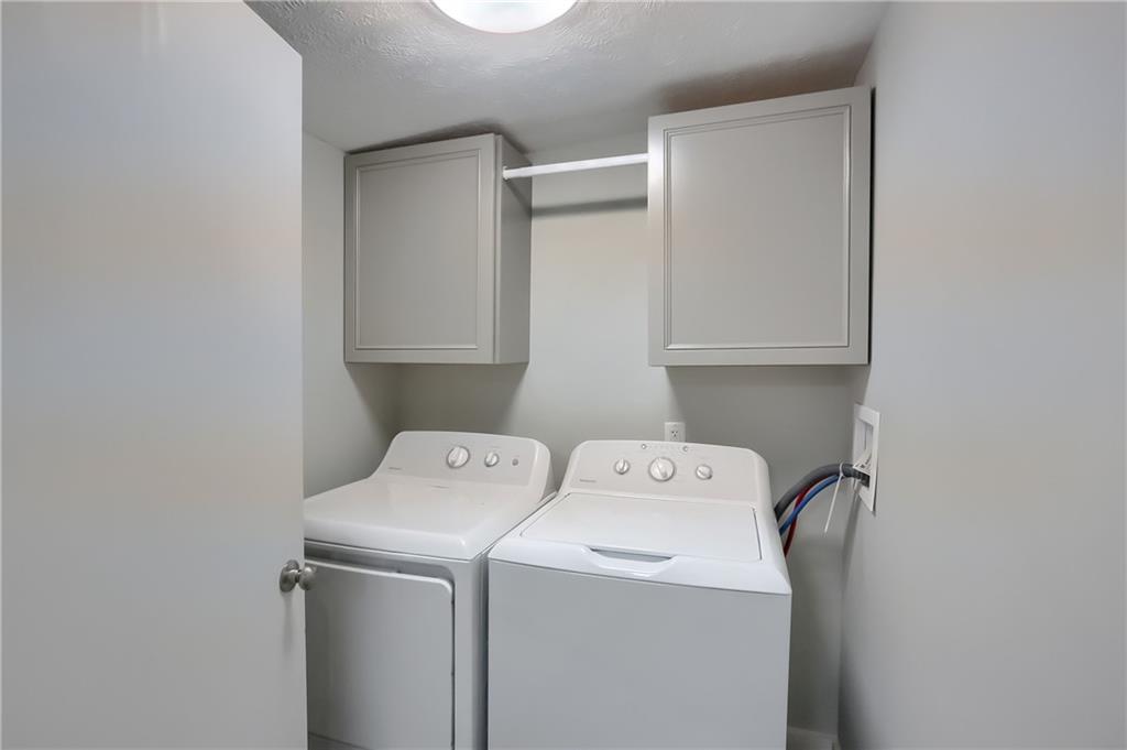 549 Sawmill Run Road Butler, PA 16001 - Photo 7 of 25 a utility room with dryer and washer