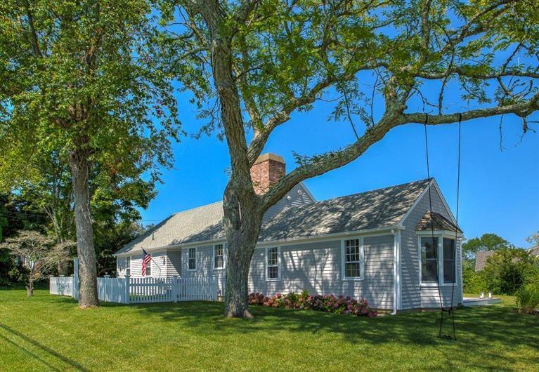 12 Salten Point Road Barnstable, MA 02630 - Photo 22 of 33 a front view of a house with a yard
