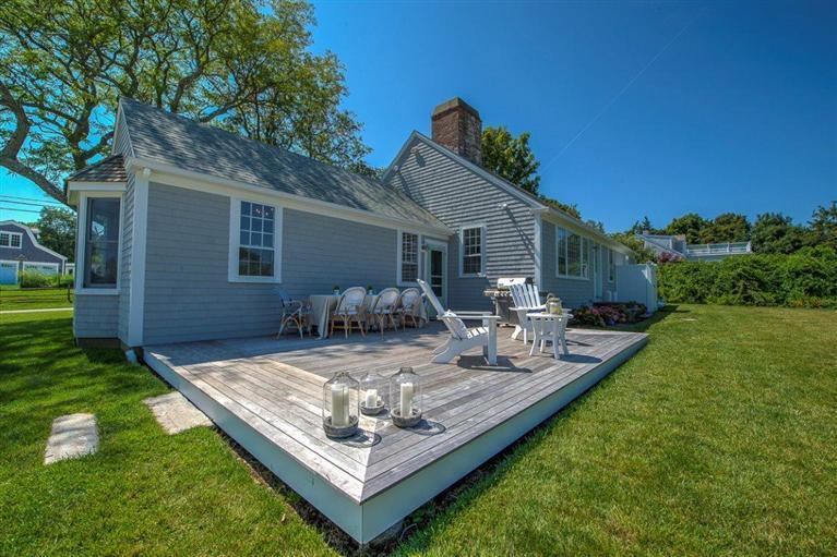 12 Salten Point Road Barnstable, MA 02630 - Photo 25 of 33 a view of a house with backyard and sitting area