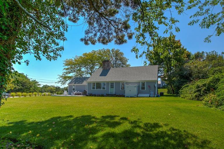 12 Salten Point Road Barnstable, MA 02630 - Photo 27 of 33 a view of a house with a yard