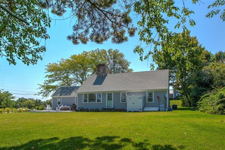 12 Salten Point Road Barnstable, MA 02630 - Photo 28 of 33 a front view of a house with garden