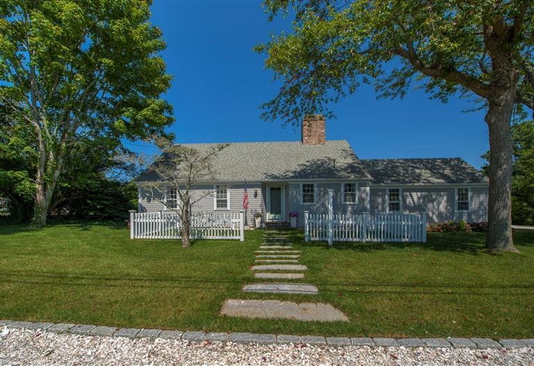 12 Salten Point Road Barnstable, MA 02630 - Photo 30 of 33 a front view of a house with a garden