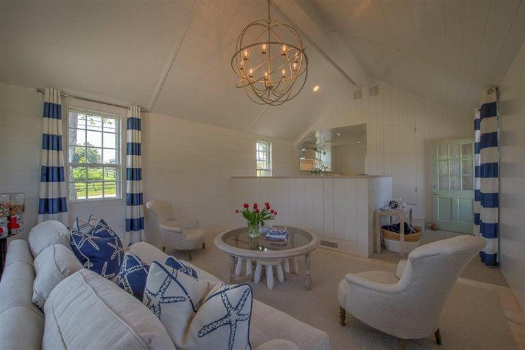 12 Salten Point Road Barnstable, MA 02630 - Photo 8 of 33 a living room with furniture a chandelier and a window