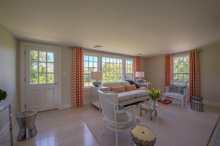 12 Salten Point Road Barnstable, MA 02630 - Photo 10 of 33 a living room with furniture and a large window