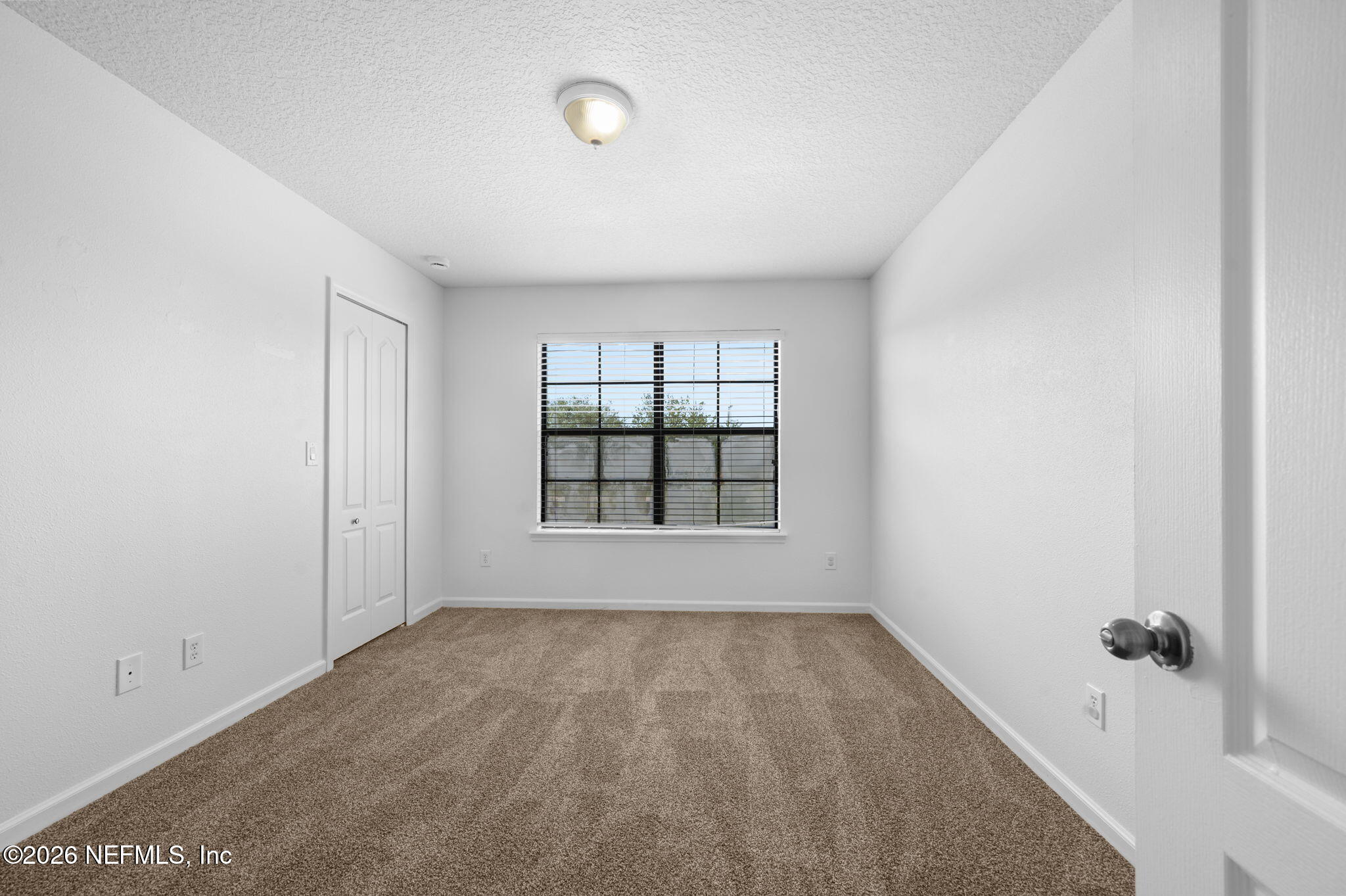 253 Syrah Way St. Augustine, FL 32084 - Photo 25 of 39 an empty room with a empty space and windows