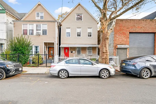 a car parked in front of a house