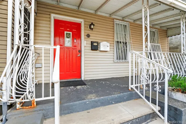 a front view of a house with a garage