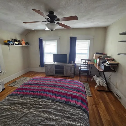 a bed room with a bed and furniture