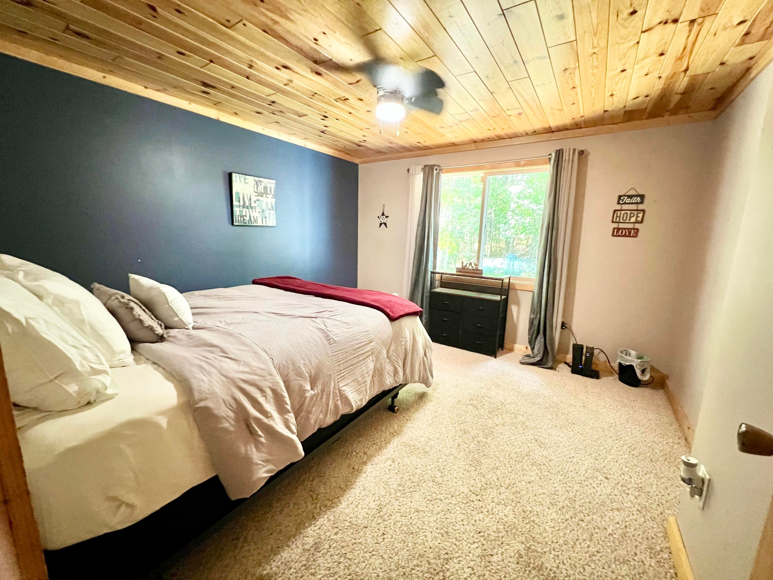 1941 High Road Roscommon, MI 48653 - Photo 21 of 54 bedroom 1 queen bed