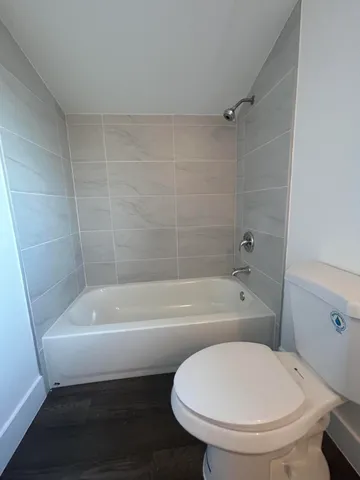 a view of a building with a street