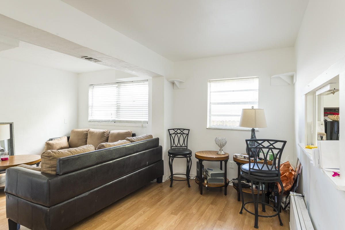 1821 Harris Avenue Key West, FL 33040 - Photo 25 of 27 a living room with furniture and wooden floor