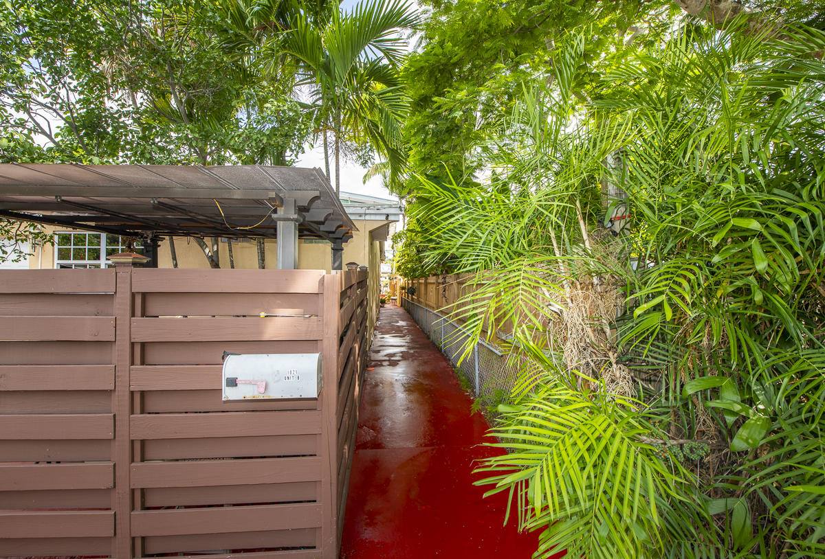 1821 Harris Avenue Key West, FL 33040 - Photo 9 of 27 a view of a house with a tree
