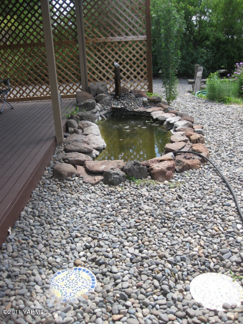 210 White Road Yakima, WA 98901 - Photo 33 of 63 a view of swimming pool from a bathroom