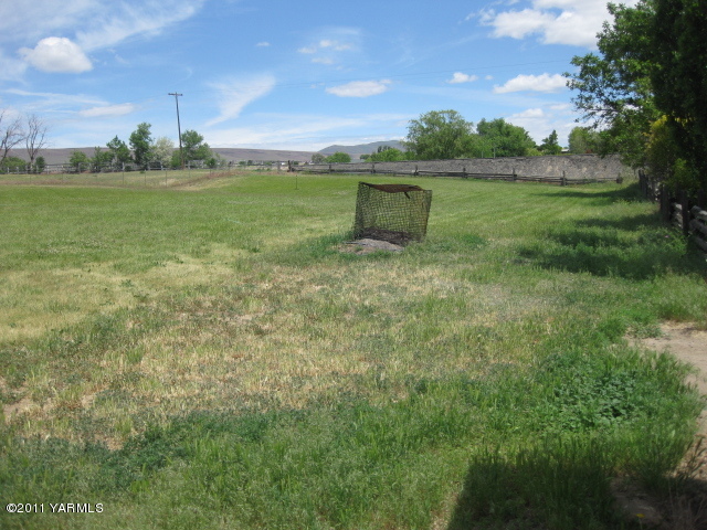 210 White Road Yakima, WA 98901 - Photo 50 of 63 a view of a garden with a lake