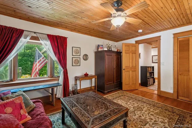 a living room with furniture and a rug