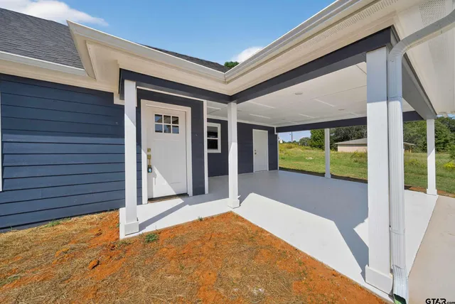 a view of a front door and porch