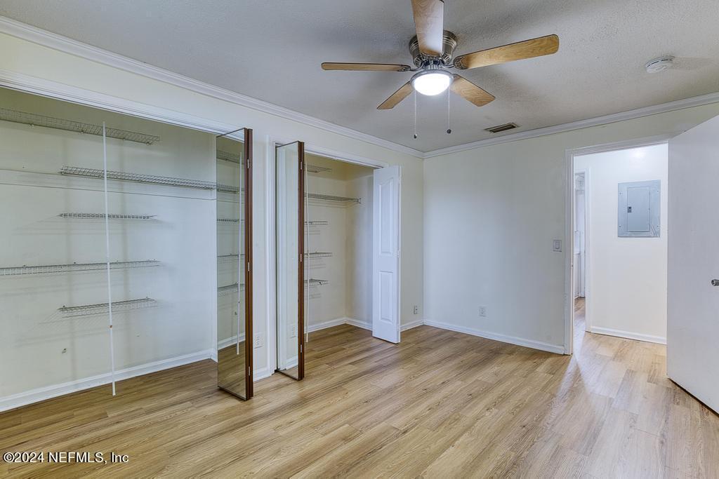 1768 El Camino Road, Unit 7 Jacksonville, FL 32216 - Photo 21 of 43 wooden floor in an empty room with a window