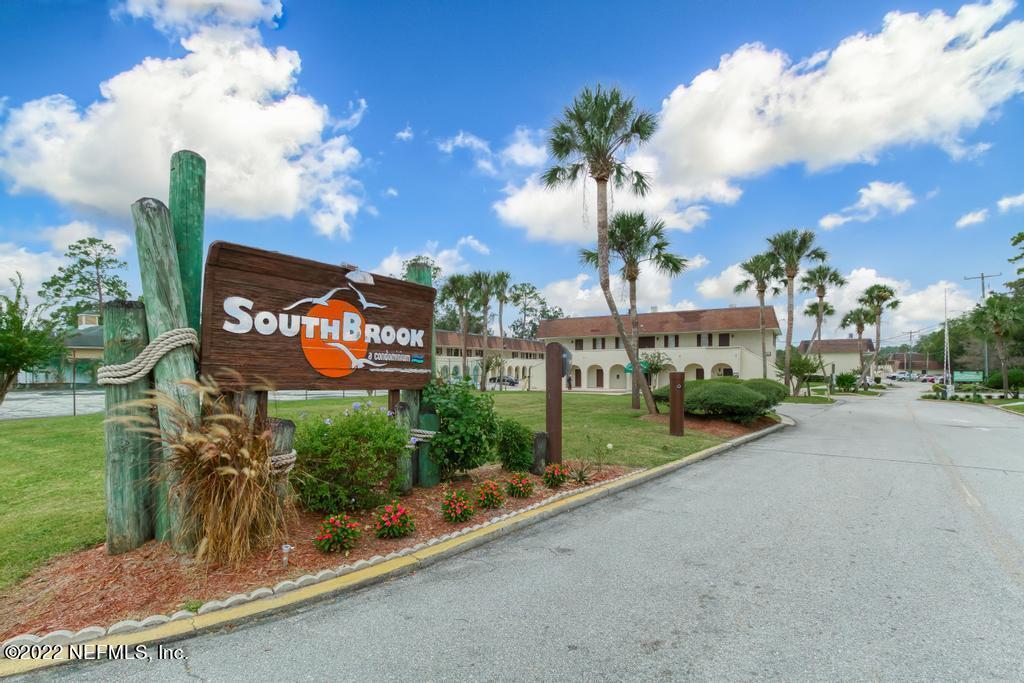 1768 El Camino Road, Unit 7 Jacksonville, FL 32216 - Photo 39 of 43 a sign on the side of a road