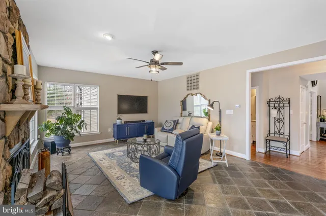 a room with furniture and a rug