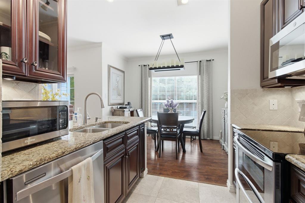 2524 Preston Road, Unit 1607 Plano, TX 75093 - Photo 17 of 28 Kitchen view toward Dining Area
