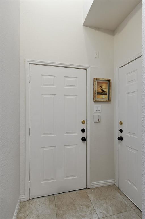 2524 Preston Road, Unit 1607 Plano, TX 75093 - Photo 6 of 28 Inside the front door and to the right is the door to the garage
