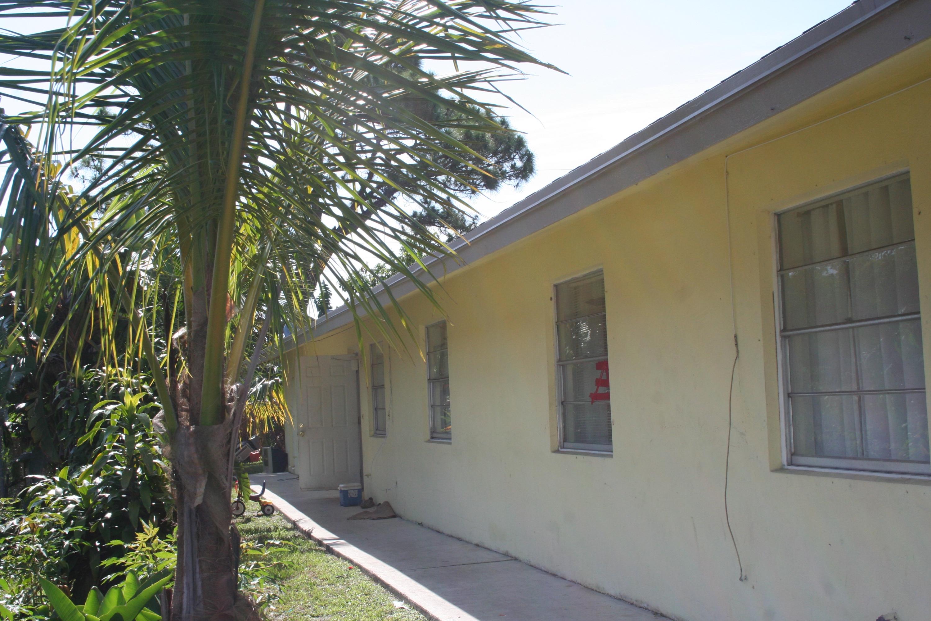 3716 Almar Road Lake Worth, FL 33461 - Photo 3 of 8 NORTH SIDE TRIPLEX