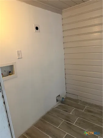 a bathroom with a sink and a shower