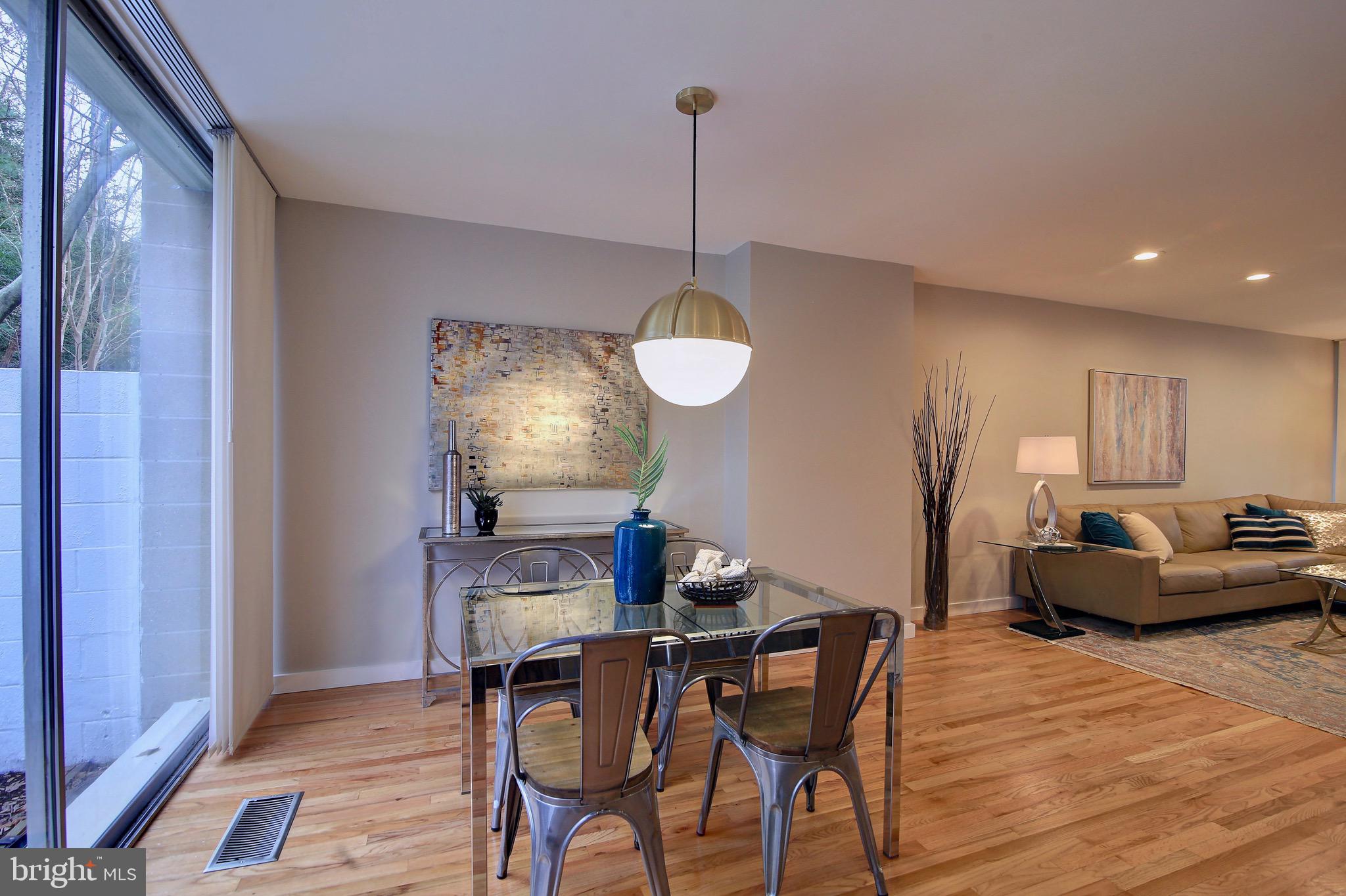 11522 Maple Ridge Road Reston, VA 20190 - Photo 8 of 39 No need for blinds in this dinning area