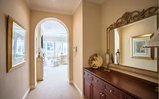 a view of a living room and bathroom