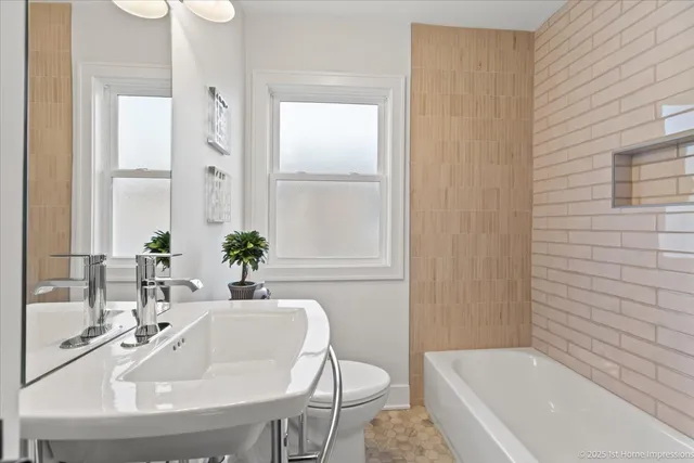 a bathroom with a sink and a bathtub