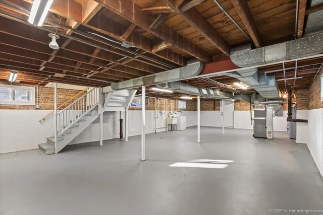 a view of a room with wooden ceiling