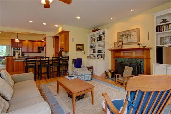 6 Glen Road Winchester, MA 01890 - Photo 16 of 30 a living room with furniture a fireplace and kitchen view
