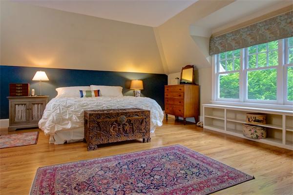 6 Glen Road Winchester, MA 01890 - Photo 18 of 30 a bedroom with a bed and a large window
