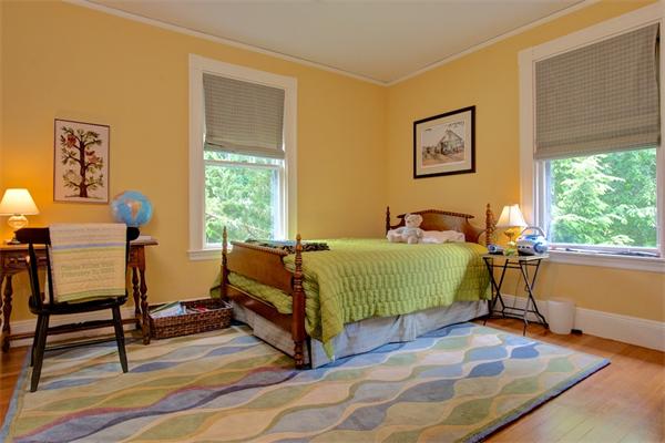 6 Glen Road Winchester, MA 01890 - Photo 19 of 30 a bedroom with a bed and a window