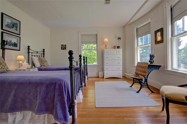 6 Glen Road Winchester, MA 01890 - Photo 20 of 30 a bedroom with furniture and a window