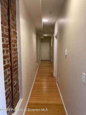 a view of hallway with stairs