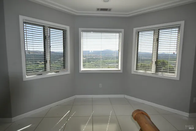 a spacious bathroom with a granite countertop sink a toilet and shower