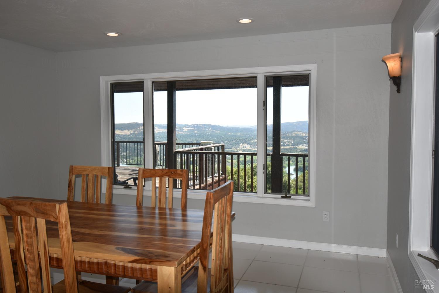 7490 Walnut Lane Lower Lake, CA 95457 - Photo 24 of 44 a view of a dining room with furniture window and outside view