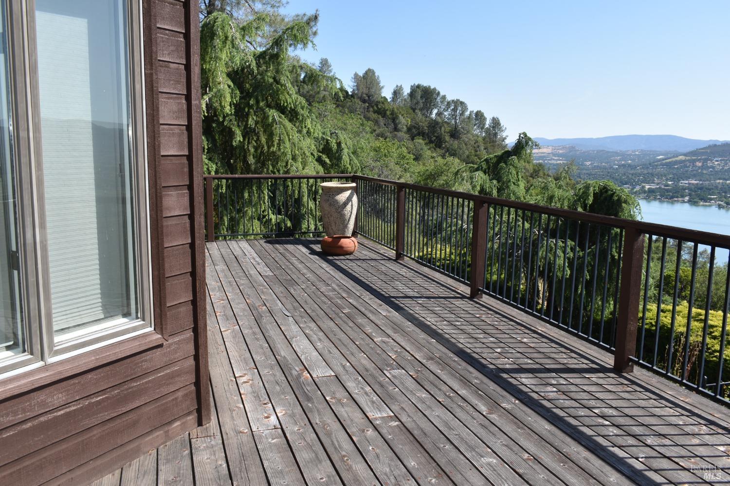 7490 Walnut Lane Lower Lake, CA 95457 - Photo 33 of 44 a view of balcony with wooden floor and fence