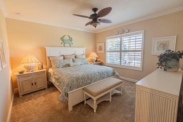 a bed room with a bed and a window