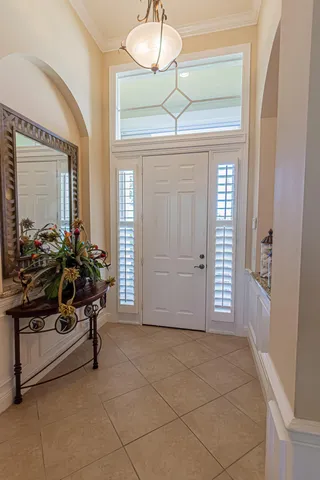 a living room with a flat screen tv and a fireplace