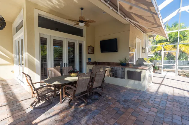 a view of a chairs and table in the patio