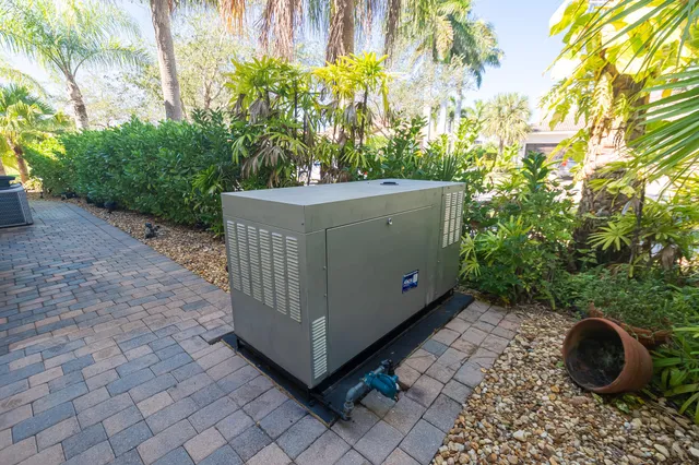 an aerial view of a swimming pool with outdoor space