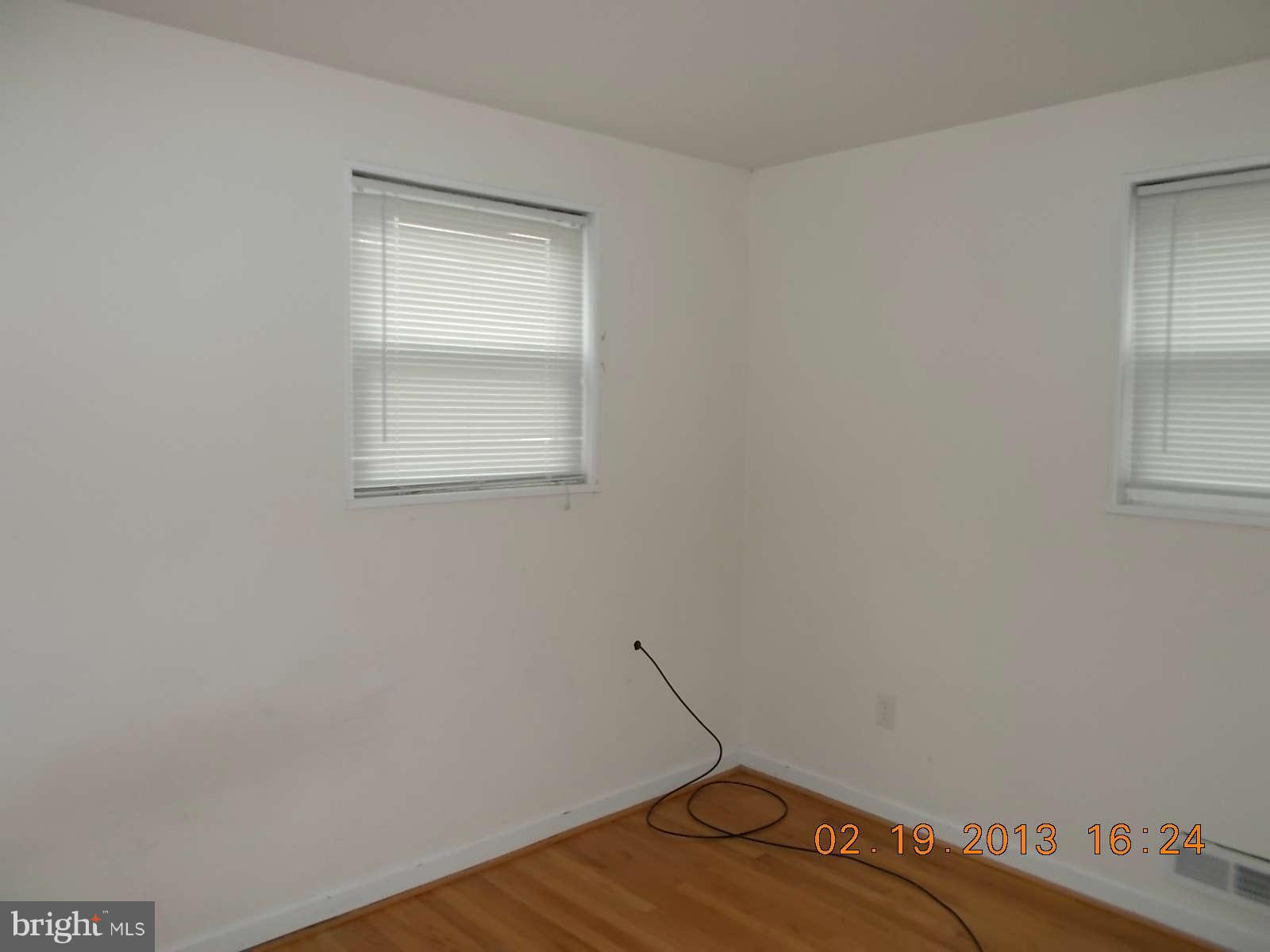 3302 Harrell Street Silver Spring, MD 20906 - Photo 13 of 18 a view of a room with rack on the wall