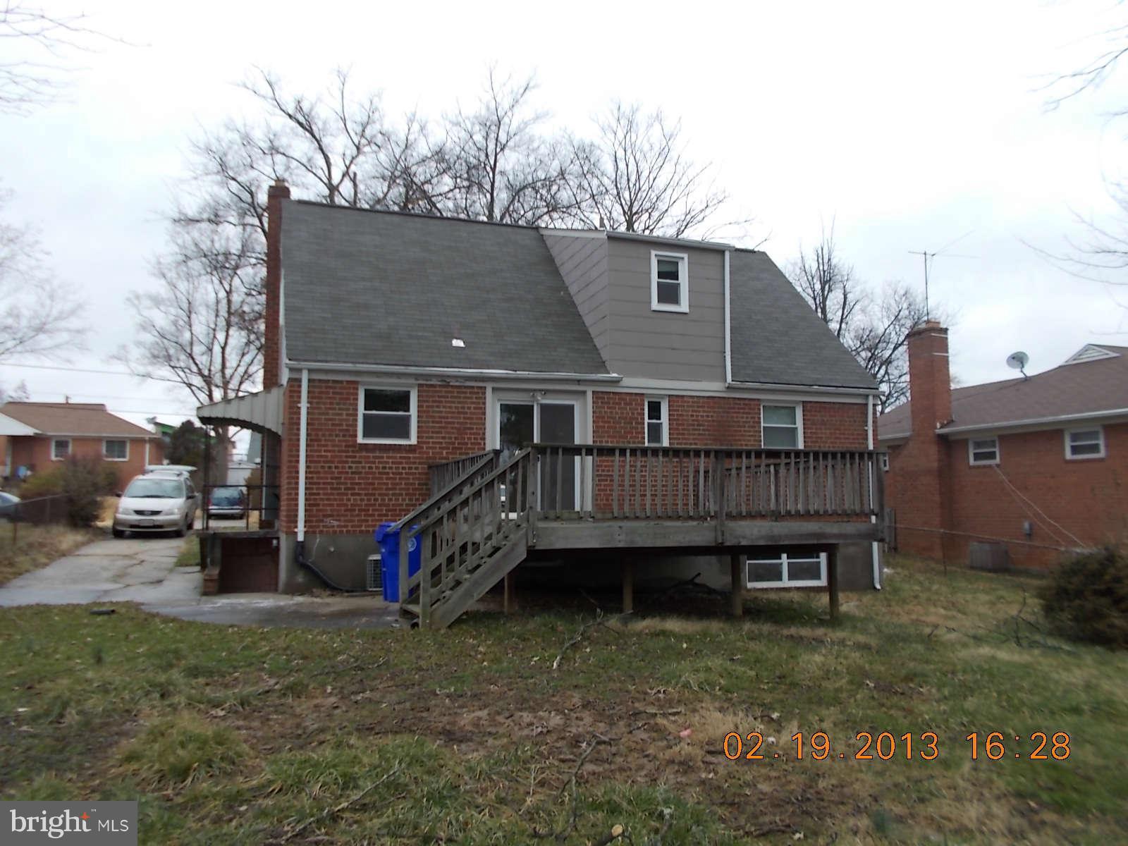 3302 Harrell Street Silver Spring, MD 20906 - Photo 18 of 18 a view of a house with a yard and sitting area